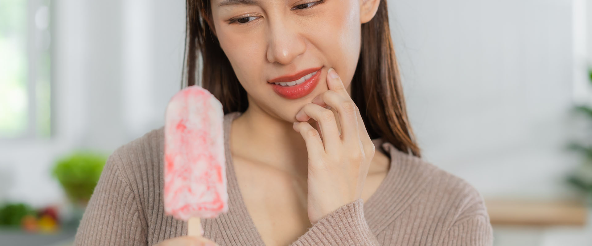 Understanding Tooth Sensitivity: Causes, Treatment, and When to See a Dentist