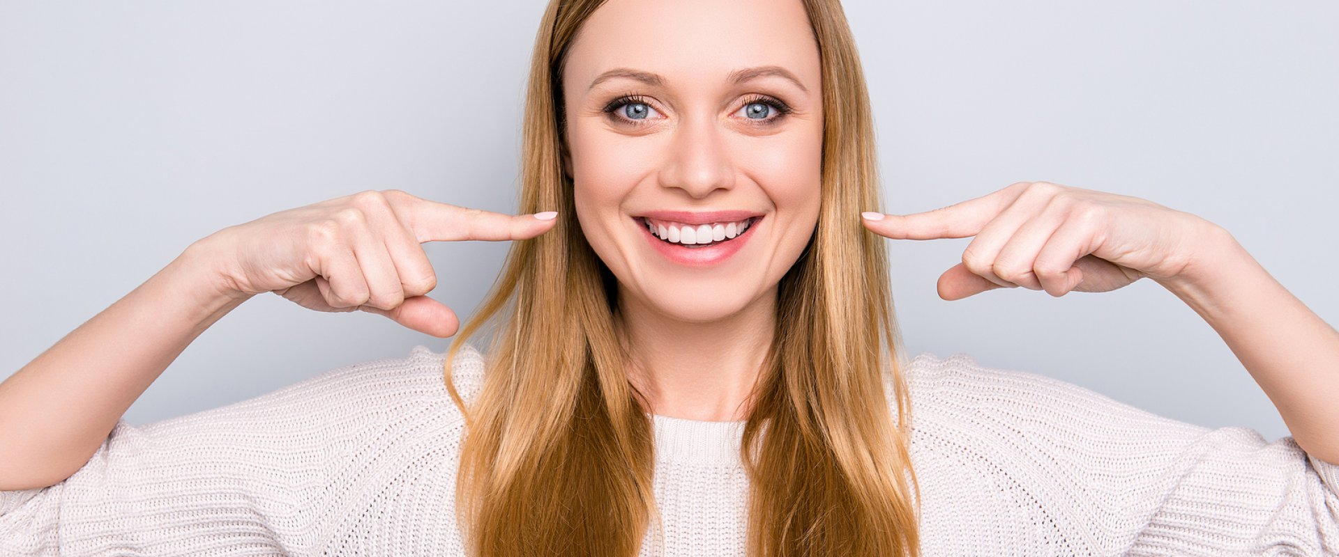 Chipped, Cracked, or Gapped? How Veneers and Direct Bonding Can Transform Your Smile This Summer